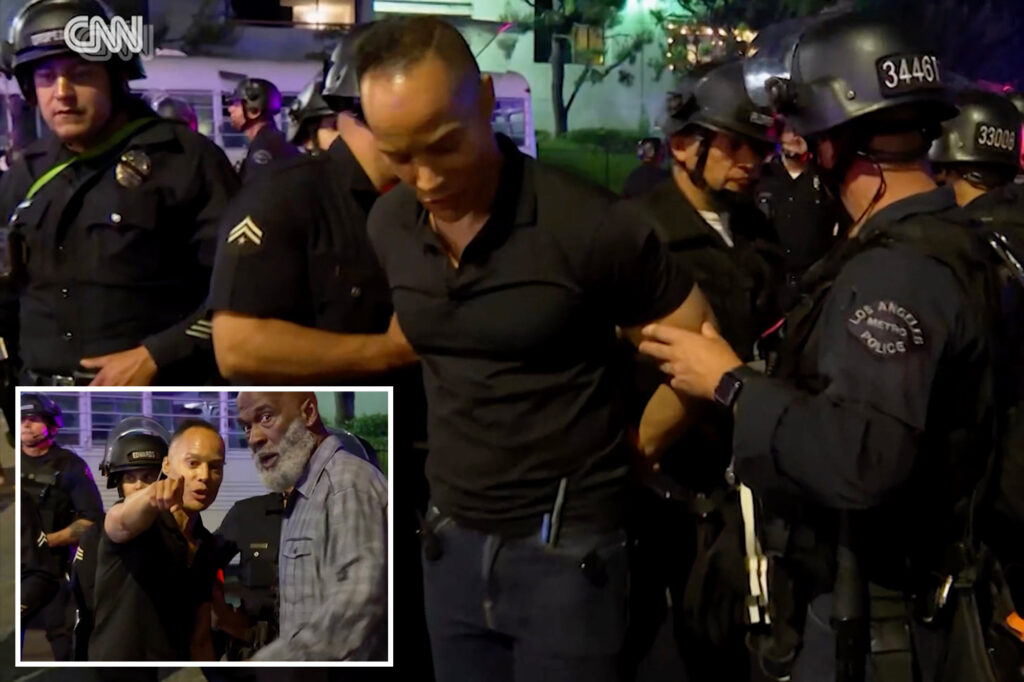 CNN journalist "detained" by police on live television while covering anti-anget